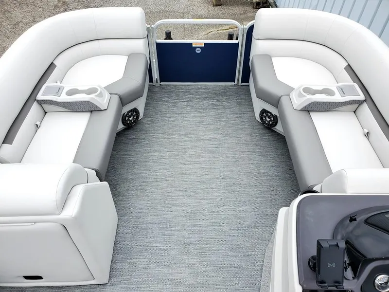 Slide: The Image of 2023 Sweetwater 2286 Xperience Split Bench OB interior with gray seating and carpet. - 3