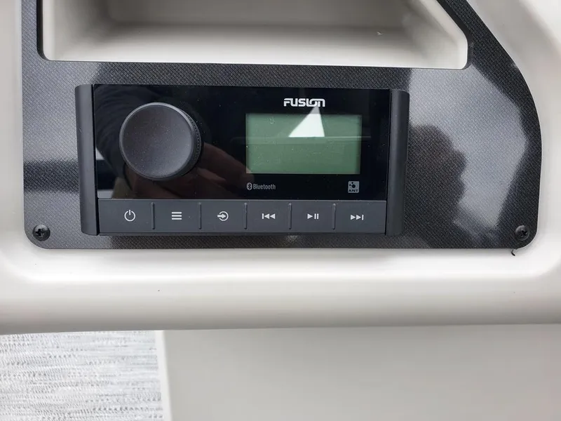 Slide: The Image of Fusion audio system on 2023 Sweetwater 2286 Xperience Split Bench OB boat. - 9