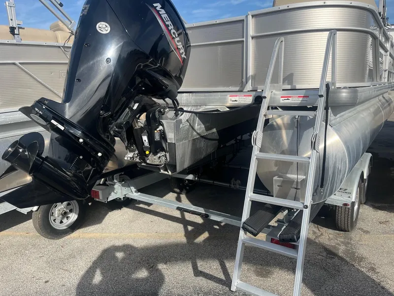 Slide: The Image of 2020 Sweetwater 2286 SB pontoon boat with Mercury outboard motor and trailer. - 4