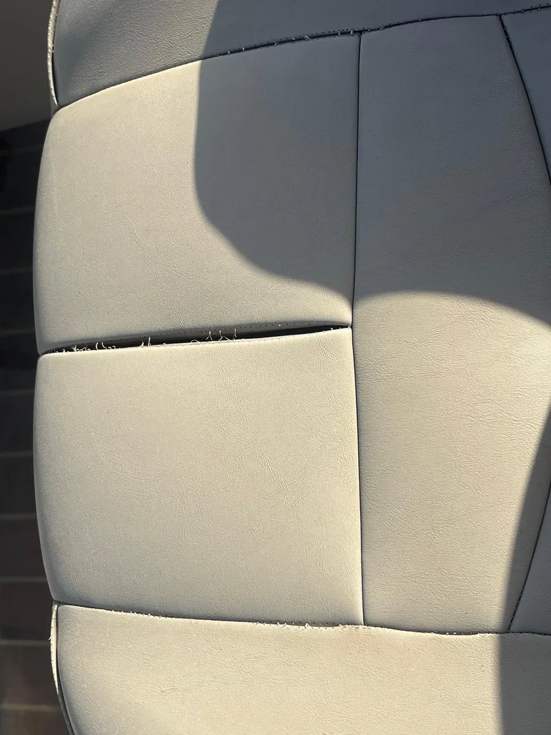 Slide: The Image of Close-up of 2020 Sweetwater 2286 SB boat seat upholstery. - 9