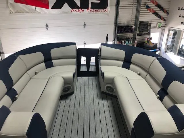 Slide: The Image of 2020 Montara 25' Surf Boss boat interior with spacious seating and modern design. - 12