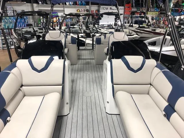 Slide: The Image of 2020 Montara 25' Surf Boss boat interior with luxurious seating and modern design. - 13