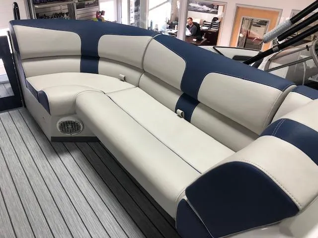 Slide: The Image of 2020 Montara 25' Surf Boss boat interior with blue and white seating. - 14