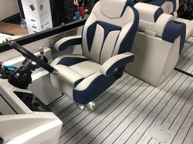 Slide: The Image of Captain's chair in 2020 Montara 25' Surf Boss boat, featuring sleek design and comfortable seating. - 17