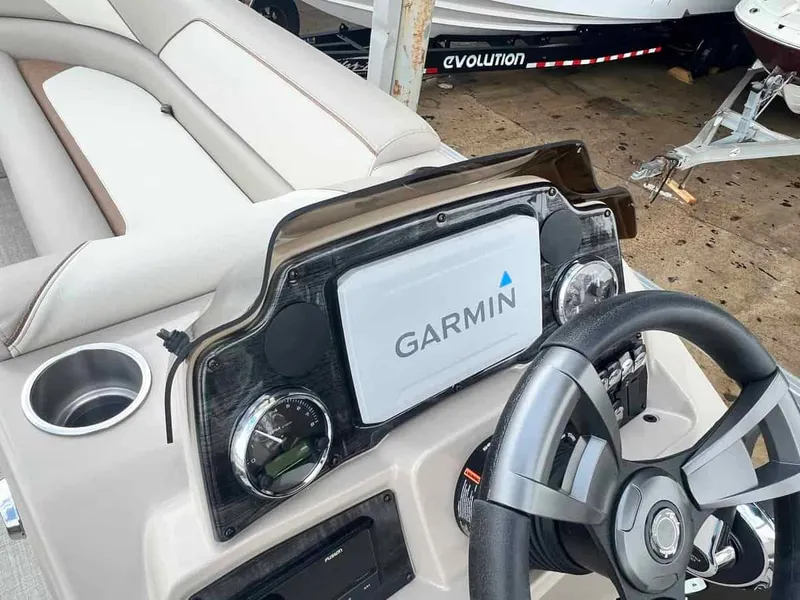 Slide: The Image of 2023 Avalon 2185 Venture CR2 boat dashboard with Garmin navigation system. - 10