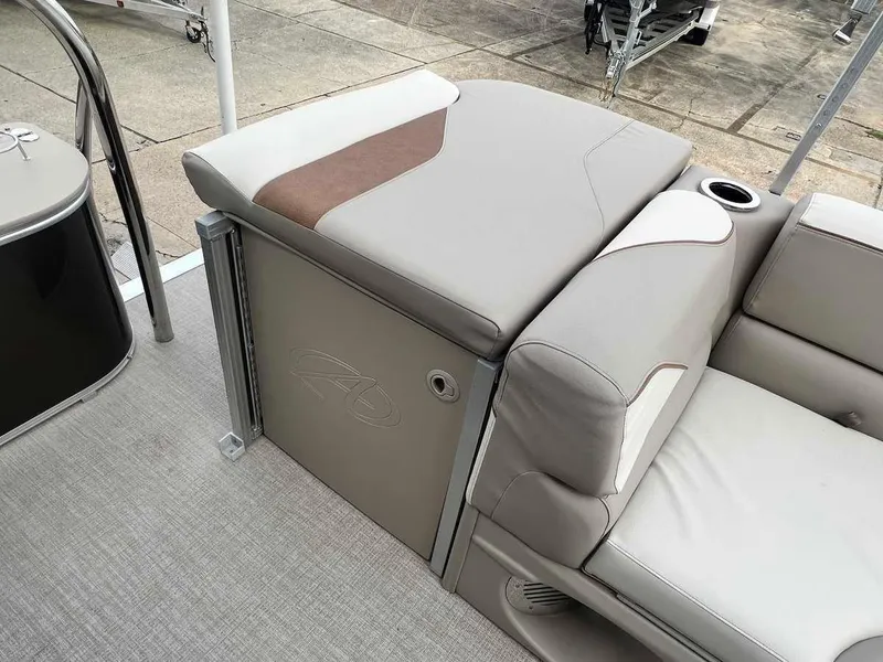 Slide: The Image of 2023 Avalon 2185 Venture CR2 boat interior seating and storage compartment. - 12