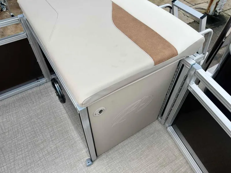 Slide: The Image of 2023 Avalon 2185 Venture CR2 boat interior seating and storage compartment. - 14