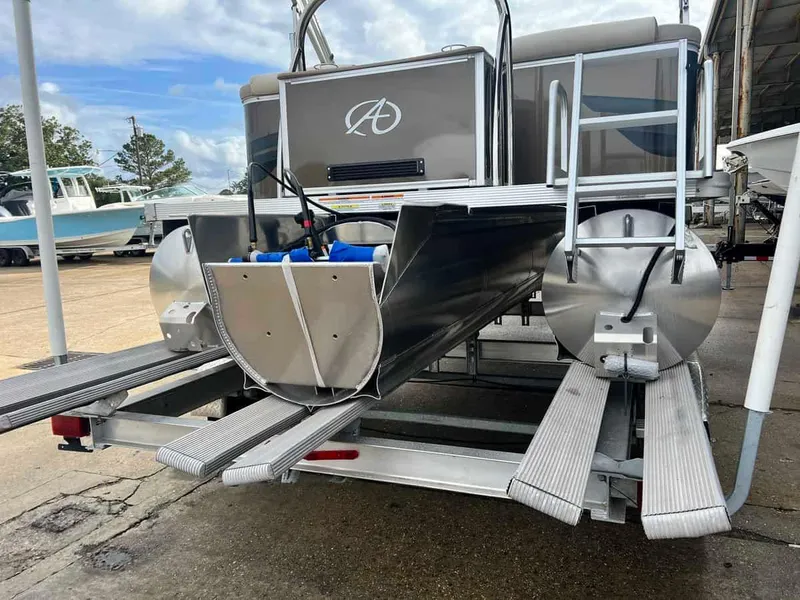 Slide: The Image of 2023 Avalon 2185 Venture CR2 pontoon boat on a trailer. - 3