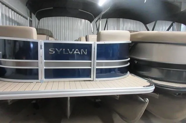 The Image of 2023 Sylvan Mirage 8524 LZ pontoon boat in storage. - 0