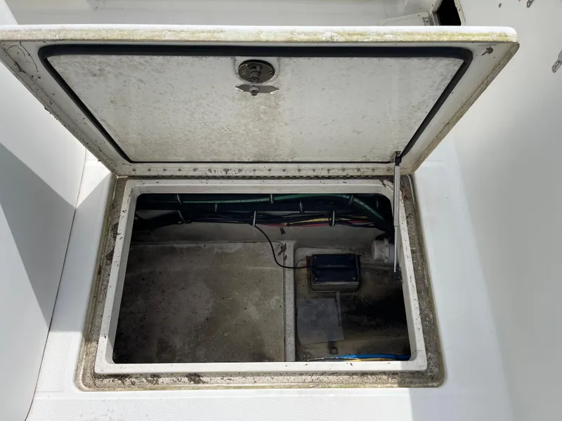 Slide: The Image of Open storage compartment on a 2009 Hydra-Sports 2900 CC boat. - 19