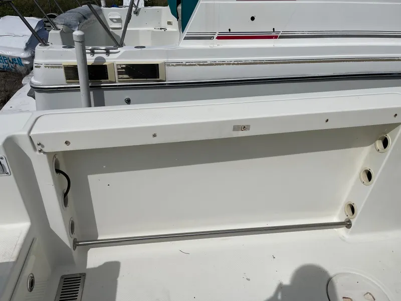 Slide: The Image of 2009 Hydra-Sports 2900 CC boat deck with storage compartment. - 20