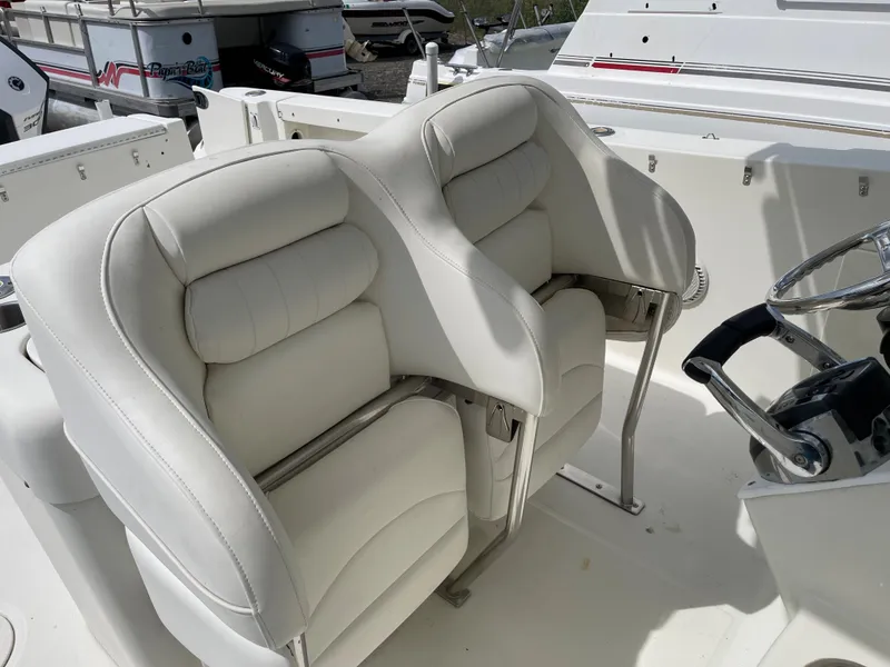 Slide: The Image of 2009 Hydra-Sports 2900 CC boat with white leather seats and steering wheel. - 23