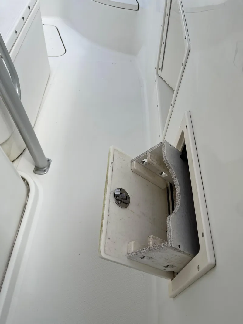 Slide: The Image of 2009 Hydra-Sports 2900 CC boat interior with open storage compartment. - 31