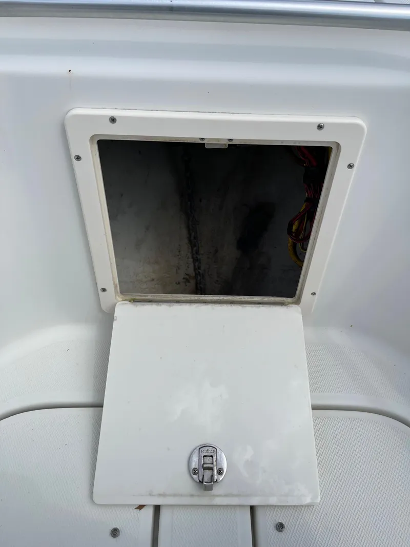Slide: The Image of Open storage compartment on a 2009 Hydra-Sports 2900 CC boat. - 36