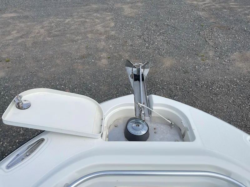 Slide: The Image of 2009 Hydra-Sports 2900 CC boat anchor compartment and winch system. - 9