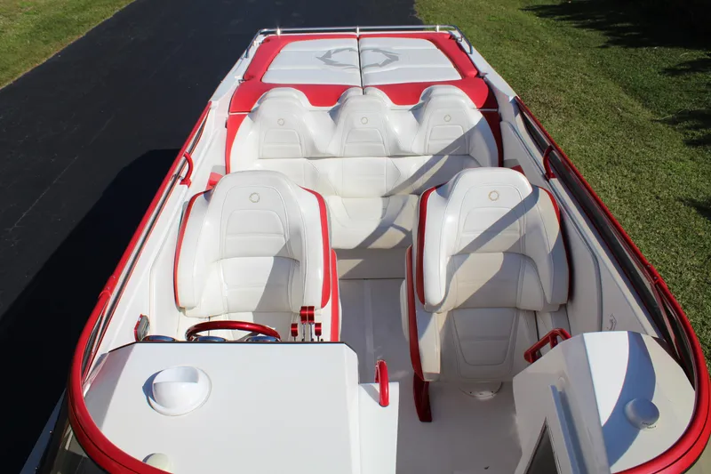 Slide: The Image of The image shows the cockpit of a 2007 Fountain 42 Lightning boat with white and red seating. - 21