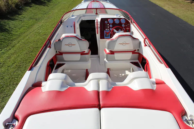 Slide: The Image of 2007 Fountain 42 Lightning with red and white seating and a sporty cockpit. - 27