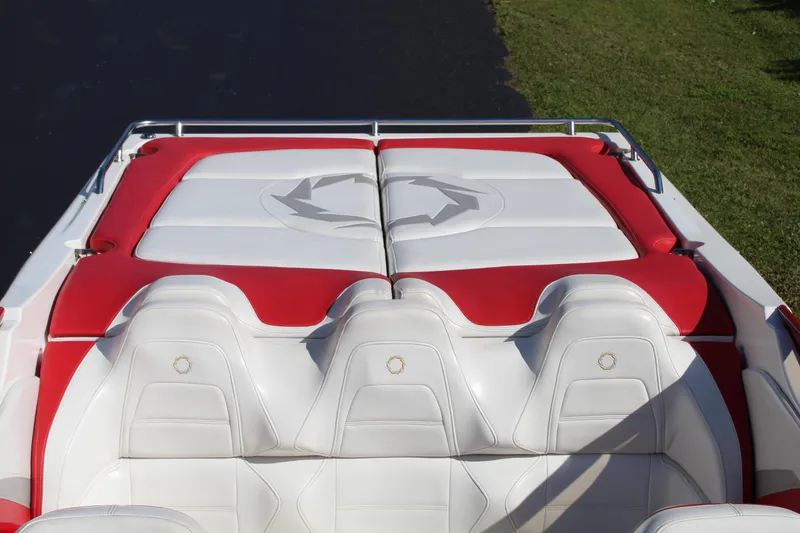 Slide: The Image of The image shows the rear of a 2007 Fountain 42 Lightning with red and white seating. - 22