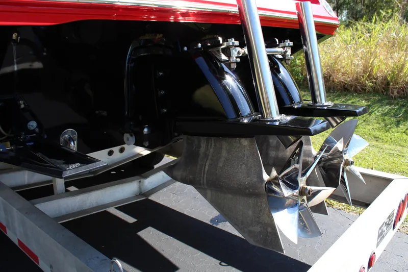 Slide: The Image of Close-up of dual propellers on a 2007 Fountain 42 Lightning boat on a trailer. - 7