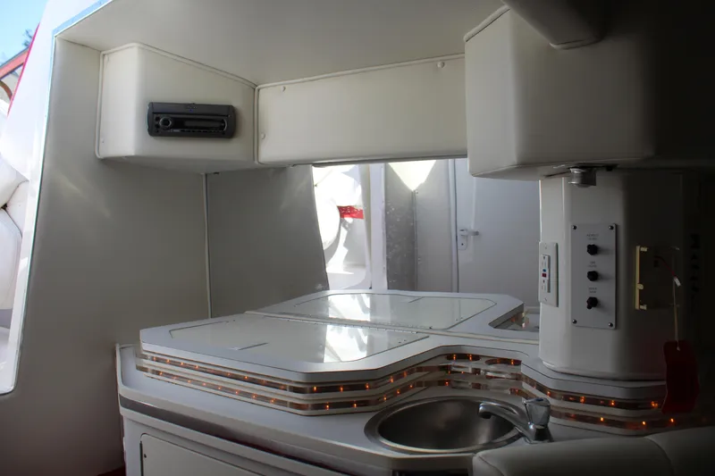 Slide: The Image of Interior of the 2007 Fountain 42 Lightning with sink and cabinets. - 46