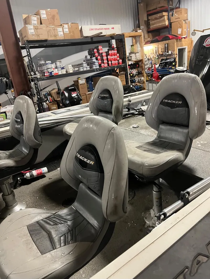Slide: The Image of 2019 Tracker Targa V-19 Combo TE boat seats in a workshop. - 3
