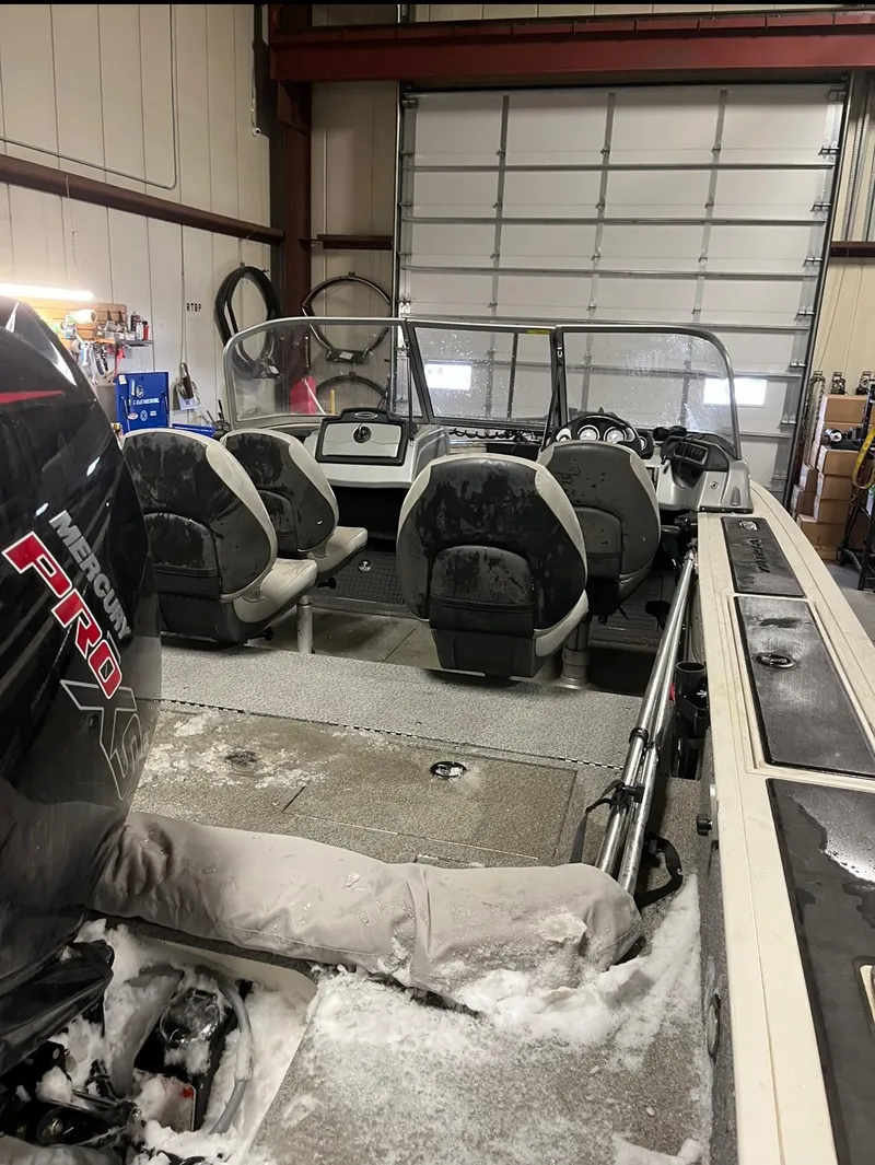 Slide: The Image of 2019 Tracker Targa V-19 Combo TE boat in a garage. - 7