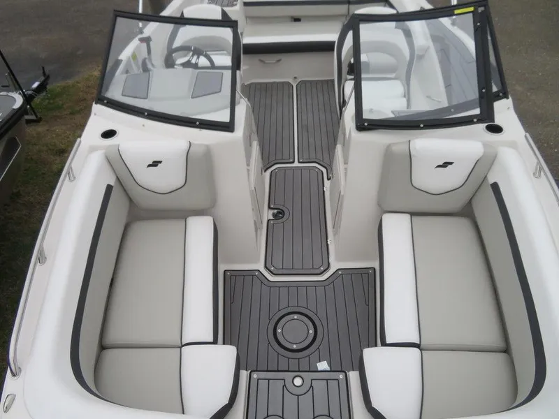 Slide: The Image of 2023 Starcraft SVX IO 210 boat interior with spacious seating and modern design. - 8