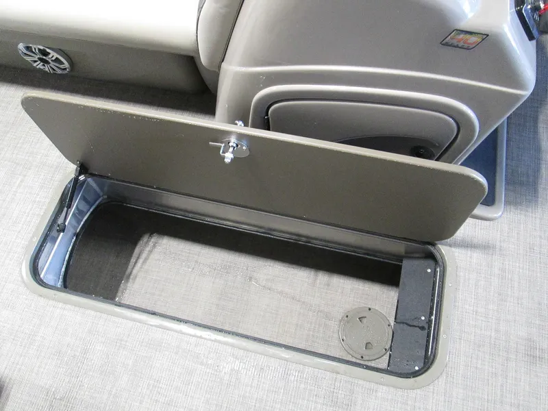 Slide: The Image of Sun Tracker SportFish 22 XP3 2023 under-seat storage compartment. - 11