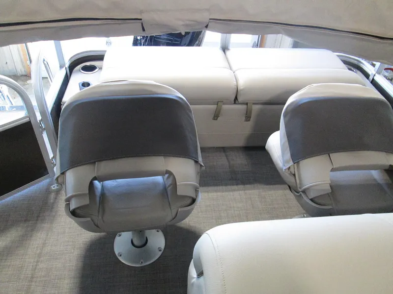 Slide: The Image of Interior of 2023 Sun Tracker SportFish 22 XP3 pontoon boat with cushioned seating. - 15