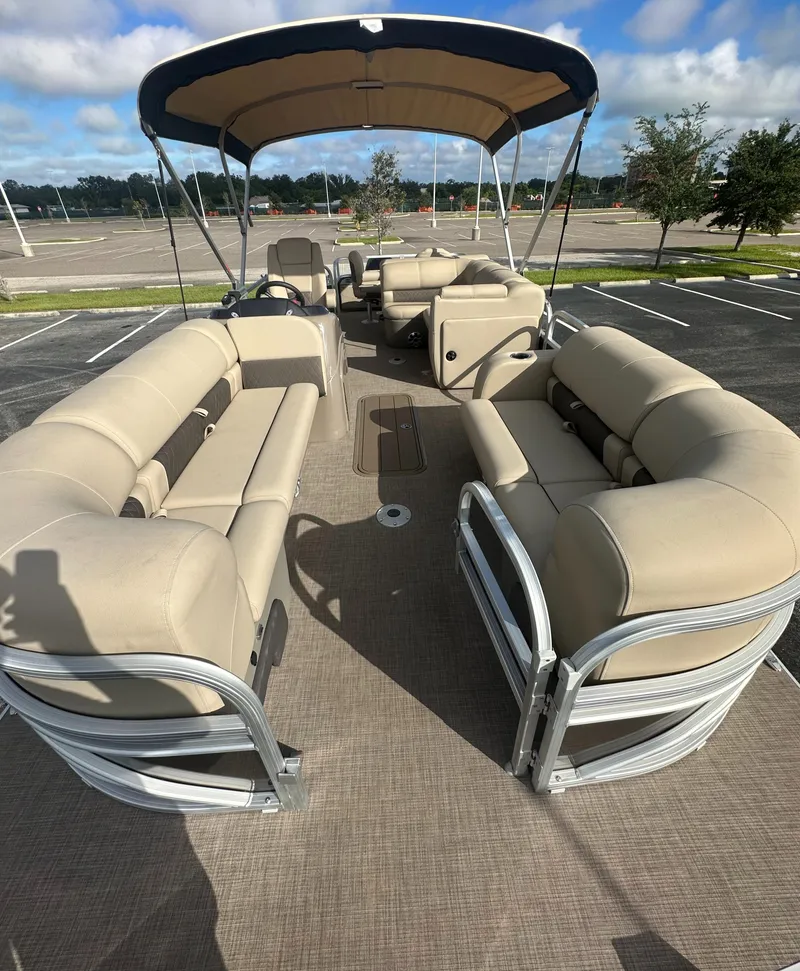 Slide: The Image of 2023 Sun Tracker SportFish 22 XP3 pontoon boat with spacious seating. - 4