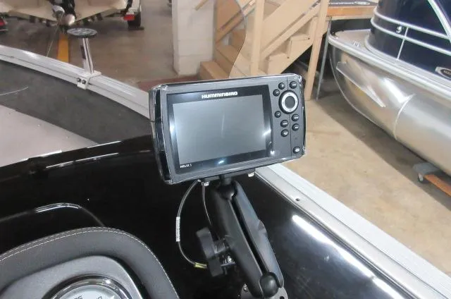 Slide: The Image of Fishfinder on 2023 Smoker Craft Pro Angler XL 171 boat dashboard in a showroom. - 7