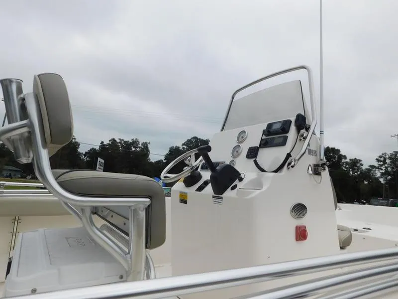Slide: The Image of 2023 Key West 189 FS boat console and seating area. - 10