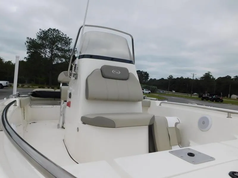 Slide: The Image of 2023 Key West 189 FS boat interior with seating and console. - 11