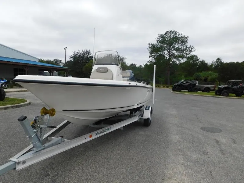 Slide: The Image of 2023 Key West 189 FS boat on a trailer in a parking lot. - 3