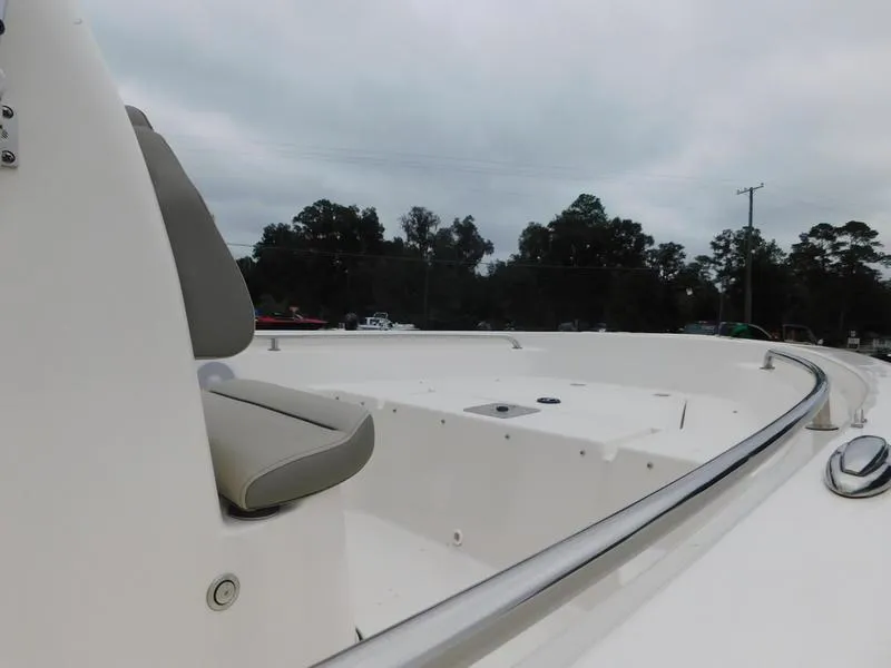 Slide: The Image of 2023 Key West 189 FS boat interior with seating and railing. - 9