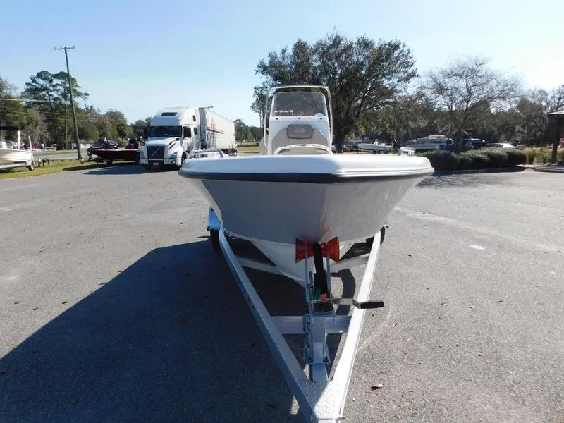 Slide: The Image of 2023 Key West 179FS boat on a trailer in a parking lot. - 3