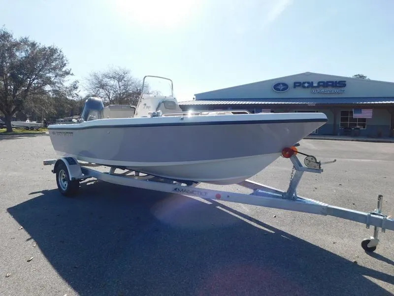 Slide: The Image of 2023 Key West 179FS boat on trailer outside Polaris dealership. - 4