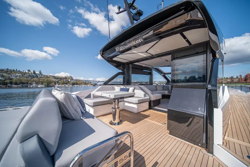 Slide: The Image of Luxurious 2025 Sunseeker Predator 55 yacht with spacious deck and modern seating. - 33