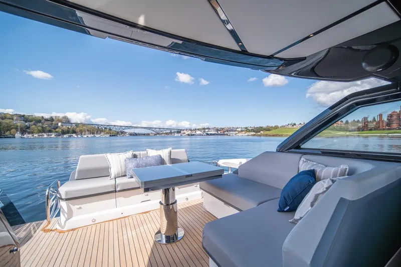 Slide: The Image of Luxurious Sunseeker Predator 55 yacht interior with scenic water view, 2025 model. - 34