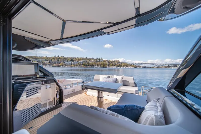 Slide: The Image of Luxurious 2025 Sunseeker Predator 55 yacht interior with scenic water view. - 35