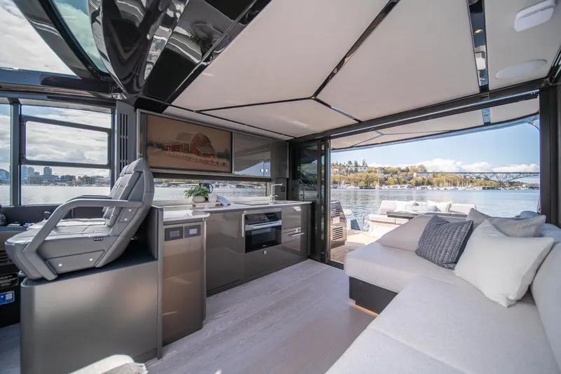 Slide: The Image of Luxurious interior of 2025 Sunseeker Predator 55 yacht with modern design and scenic water views. - 39