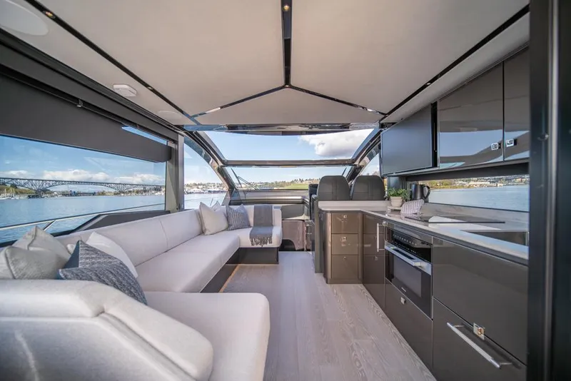 Slide: The Image of Luxurious interior of 2025 Sunseeker Predator 55 yacht with modern design and panoramic views. - 4