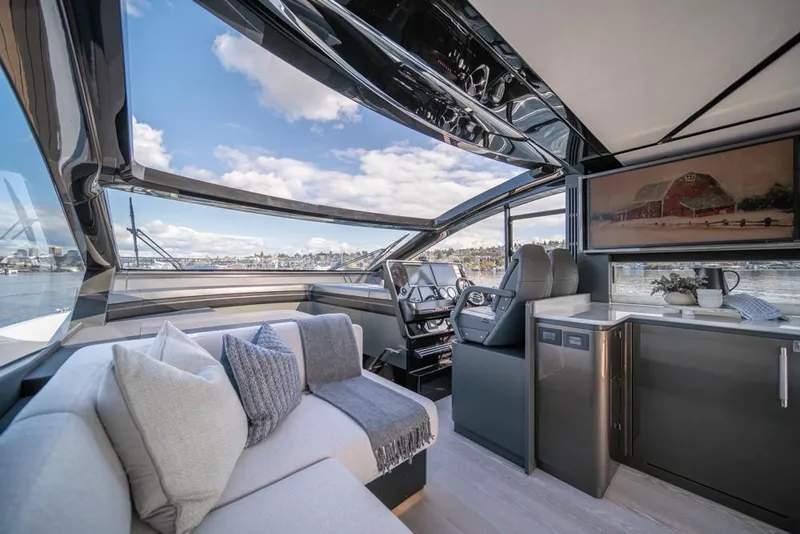 Slide: The Image of Luxurious interior of 2025 Sunseeker Predator 55 yacht with modern design and panoramic windows. - 41