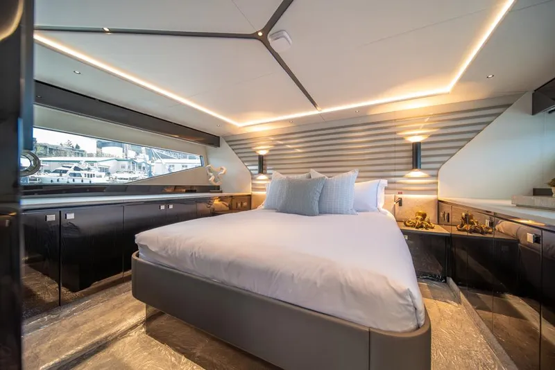 Slide: The Image of Luxurious bedroom interior of 2025 Sunseeker Predator 55 yacht with modern design and ambient lighting. - 46