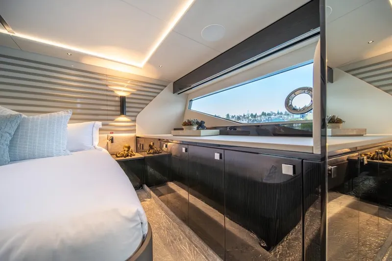 Slide: The Image of Luxurious interior of 2025 Sunseeker Predator 55 yacht with modern design and scenic window view. - 47