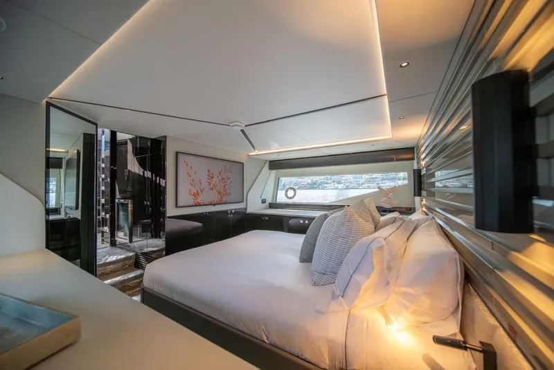 Slide: The Image of Luxurious interior of 2025 Sunseeker Predator 55 yacht bedroom with modern design. - 49