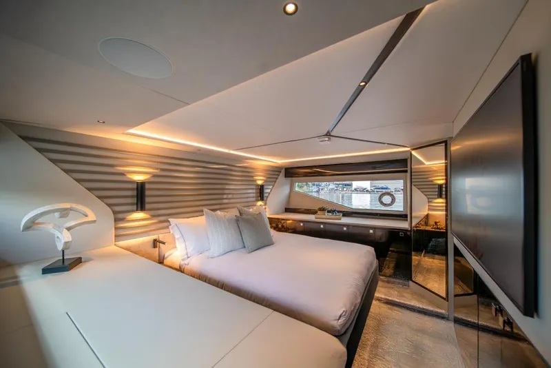 Slide: The Image of Luxurious interior of 2025 Sunseeker Predator 55 yacht bedroom with modern design. - 6
