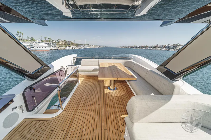 Slide: The Image of Luxurious 2025 Sunseeker Manhattan 68 yacht with spacious deck and elegant seating area. - 31