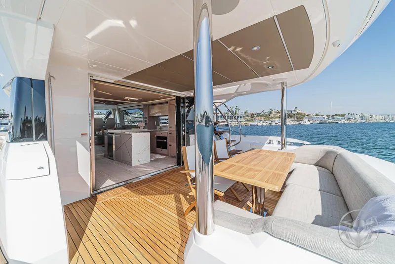 Slide: The Image of Luxurious Sunseeker Manhattan 68 yacht, 2025 model, featuring elegant outdoor seating and ocean views. - 38