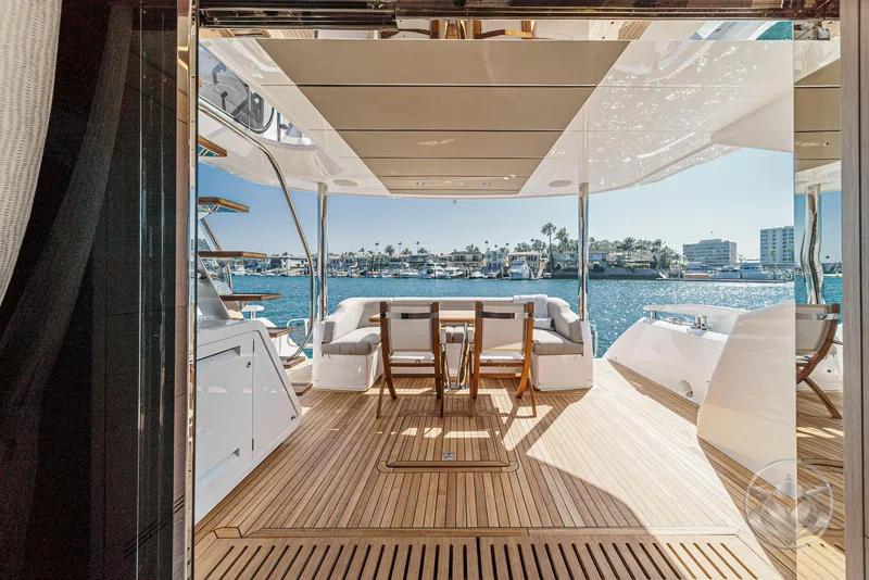 Slide: The Image of Luxurious 2025 Sunseeker Manhattan 68 yacht with spacious deck and stunning waterfront view. - 39